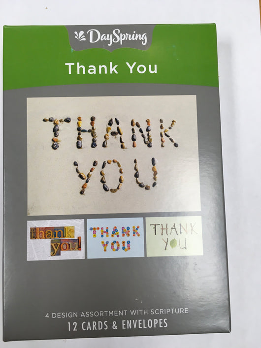 Thank you cards outlined in small rocks