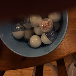 Pink and blue Baby Rosary in egg